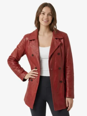 Front view of the Madame Web jacket featuring a double-breasted button closure and lapel collar, worn by a smiling model